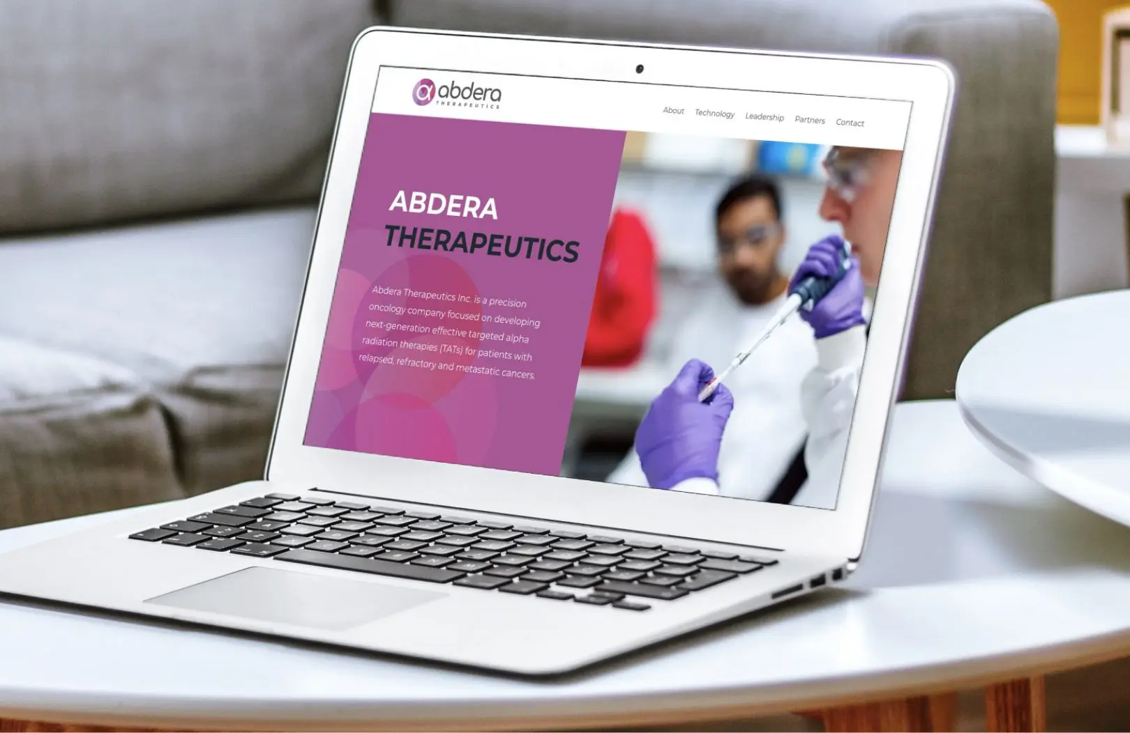 Abdera Therapeutics website homepage design shown on a laptop