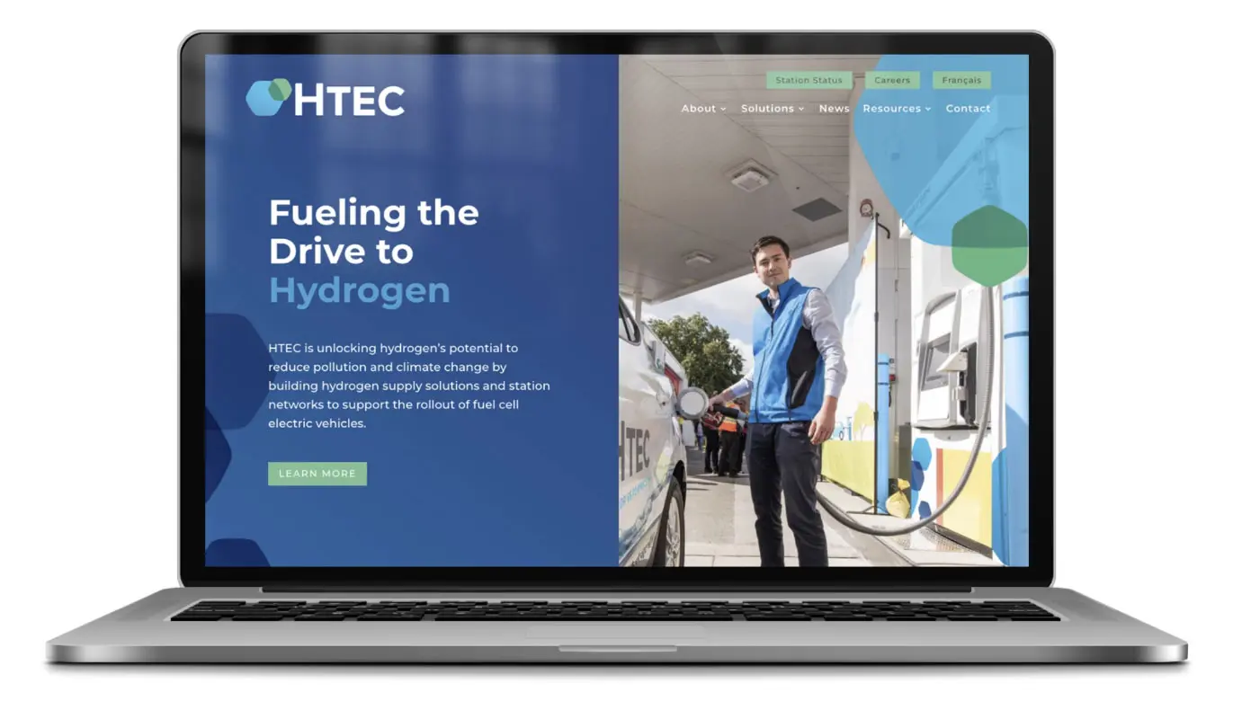HTEC website homepage design displayed on laptop